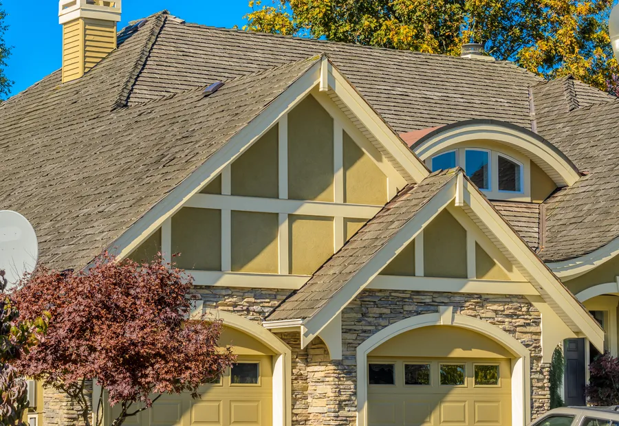 Two story suburban home with fresh architectural shingles