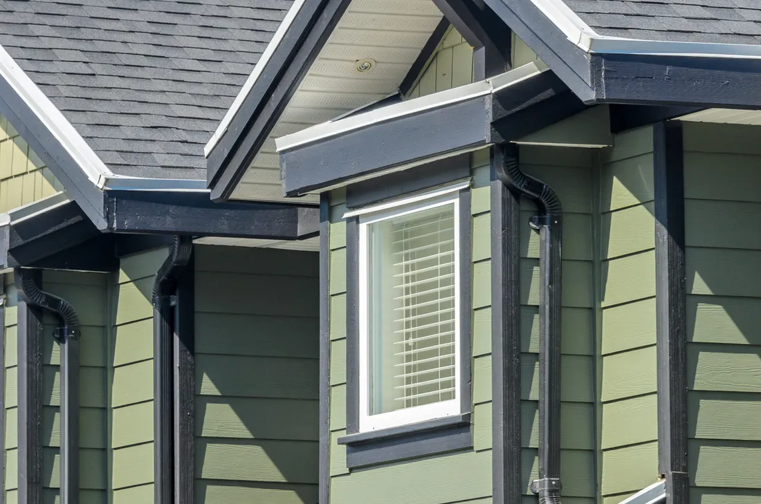 Two story suburban home with architectural shingle roof